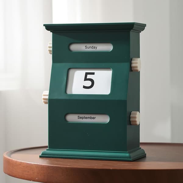 Retro skrivbordskalender med roterande månader - grön