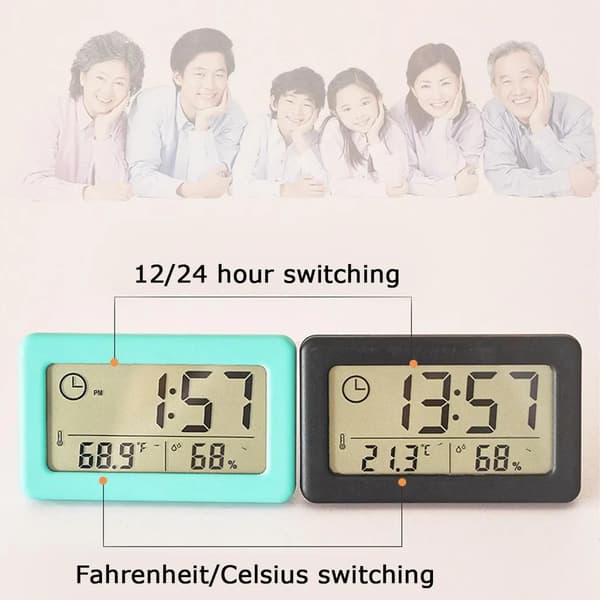 Digital väckarklocka med termometer och hygrometer, LED-display som visar inomhusfuktighet, vit.