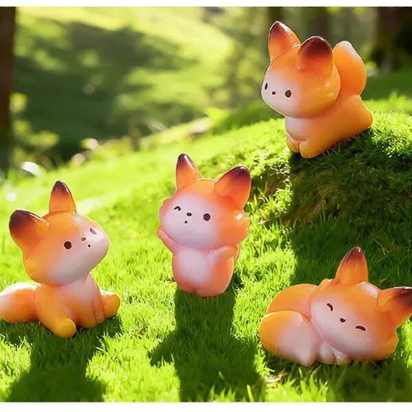 Hartfigurer, miniatyrrävar, orange/vit, set om 4 st.