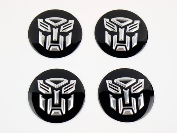 Transformers emblem till centrumkåpor, hjulnavsskydd, fälg, 4-pack, styling.
