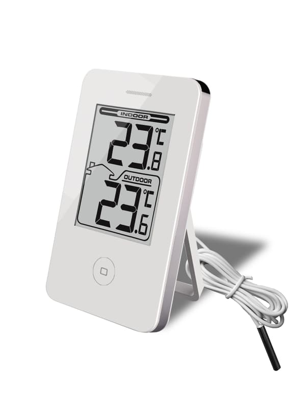 Digital termometer som mäter temperaturen både inne och ute.