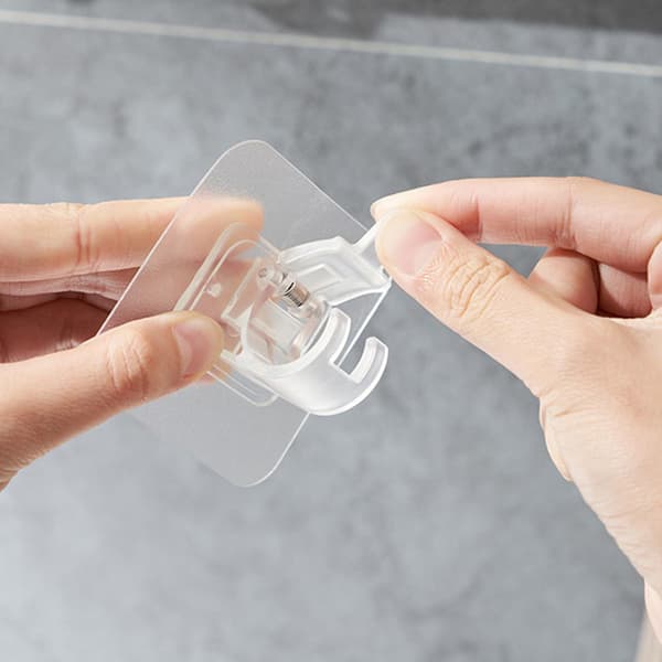 Itsekiinnittyvä pidike verhotankoon 2 kpl Transparent
