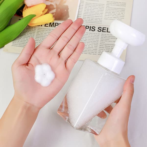 Skummande handtvålsdispenser blomform