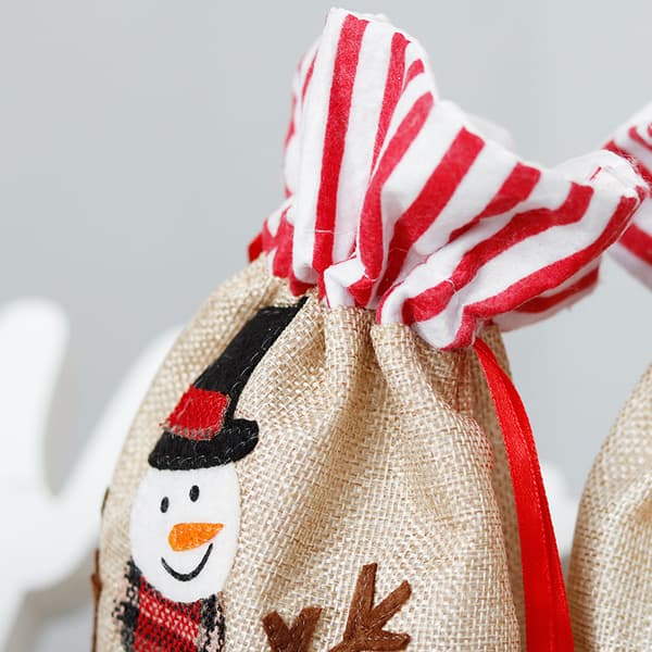 Julklappssäck liten med snögubbe