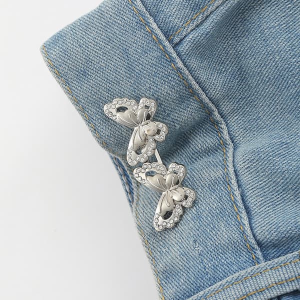 Spenne i strass og sommerfugldesign til jeans (5 par) Silver
