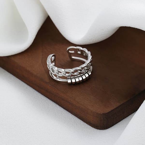 Justerbar antistressring med roterbare ringer Silver