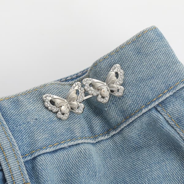Spenne i strass og sommerfugldesign til jeans (5 par) Silver