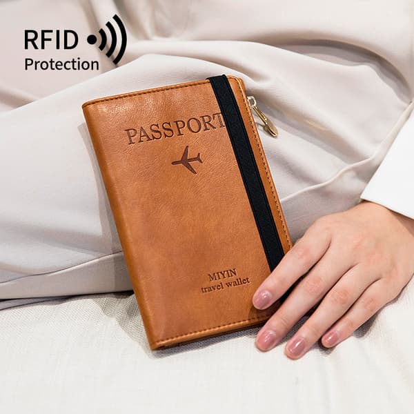 Slim RFID-blokerende paspung - multifunktionel rejsearrangør LightBrown