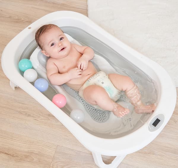 Babybadkar hopfällbart | grå | med badstöd, termometer och 5 bollar