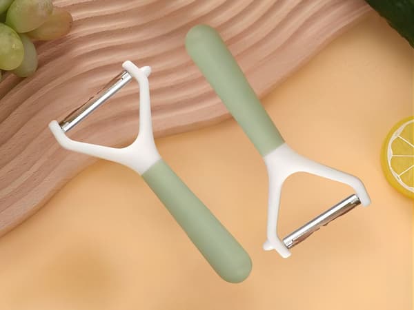 Grönsaksskalare dubbelblad ergonomisk