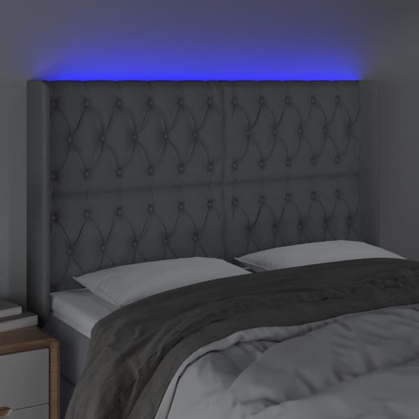 Sänggavel LED ljusgrå 163x16x118/128 cm tyg