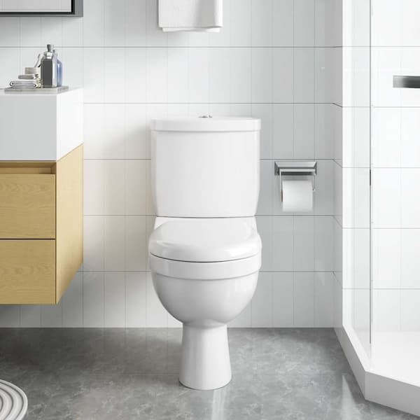 Toalett med cistern vit