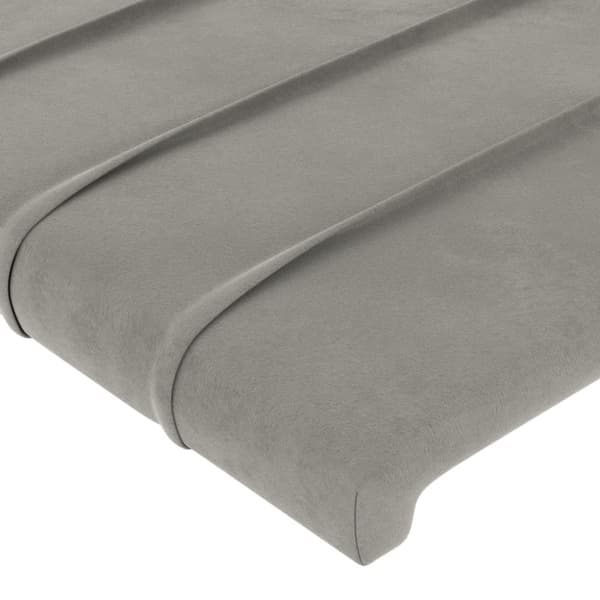 Sänggavel LED ljusgrå 83x16x118/128 cm sammet