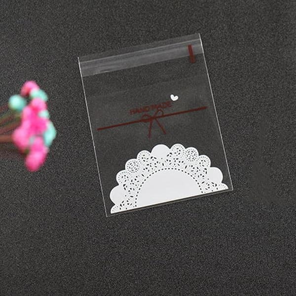 Sammetsrosetter - 100 st 14*14 cm plastpåse cellofanförpackning