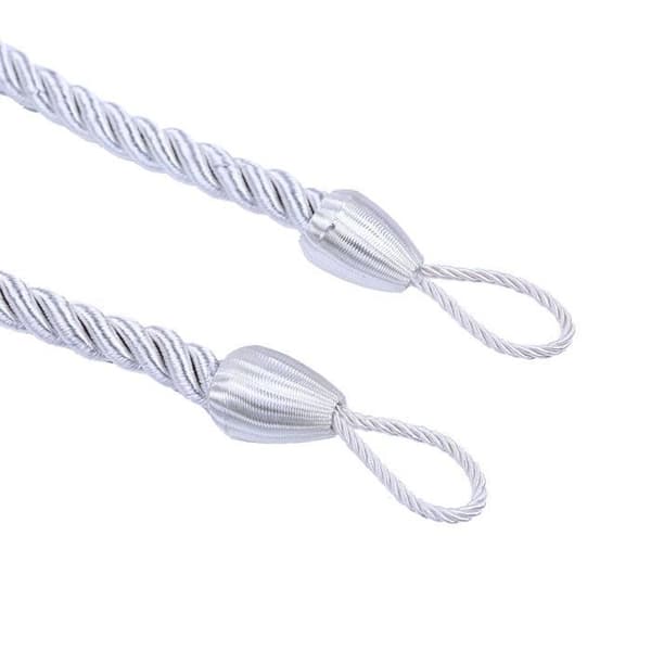 Ett par gardinklämmor, sladdklämmor, ögleklämmor