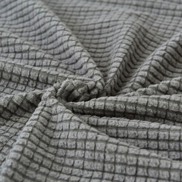 Elastiskt, halkfritt sofföverdrag med våffelnät i fleece i grått