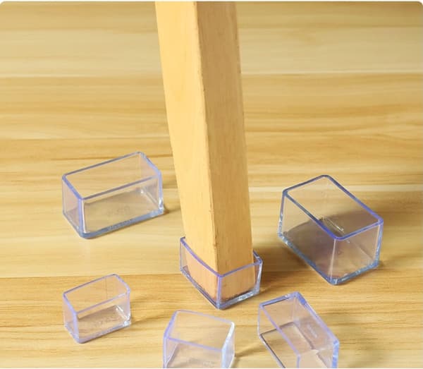 Set med 16 rektangulära golvskydd i silikon för stolsben - 20 x 30 mm, Transparent