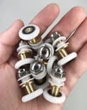 Reservedele til brusedørsruller - 8 stk. - 23 mm