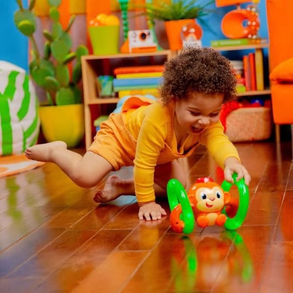BRIGHT START Petit singe Roll & Glow
