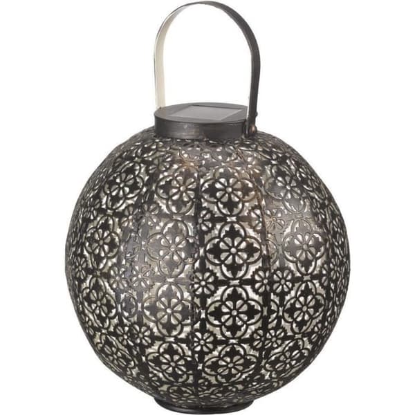 Damaskoksen aurinkolyhty metalliaukossa