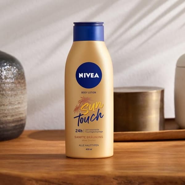 366791 NIVEA Sun Touch Bronzande Lotion för Kroppen 400 ml
