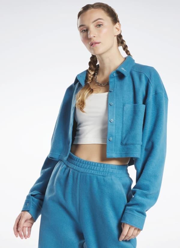 Reebok dame blå skjorte med knapper L 0AXA3* L 0_X BAGGRUNDE