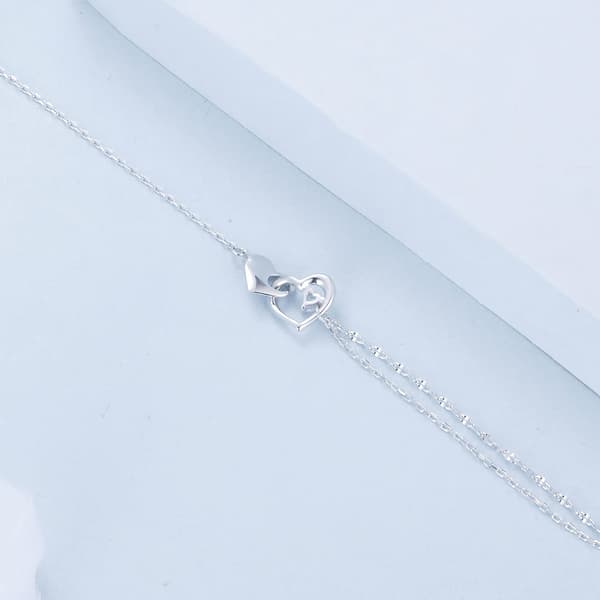 Silverarmband med sammankopplade hjärtan, 925 silver