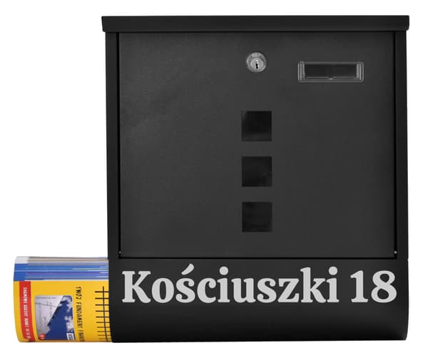 Hansin musta postilaatikko kaiverruksilla