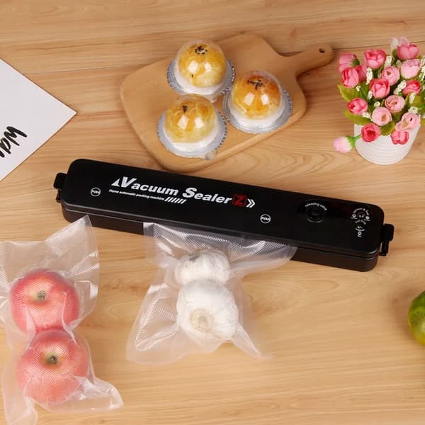 VAKUUMFORSEGLINGSMASKINE TIL FØDEVARER + POSER