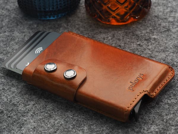 FUNKY pung lavet af Nomad cognac-læder