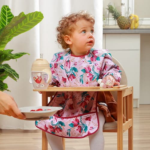 Blommig långärmad haklapp 2 år+, Babyono