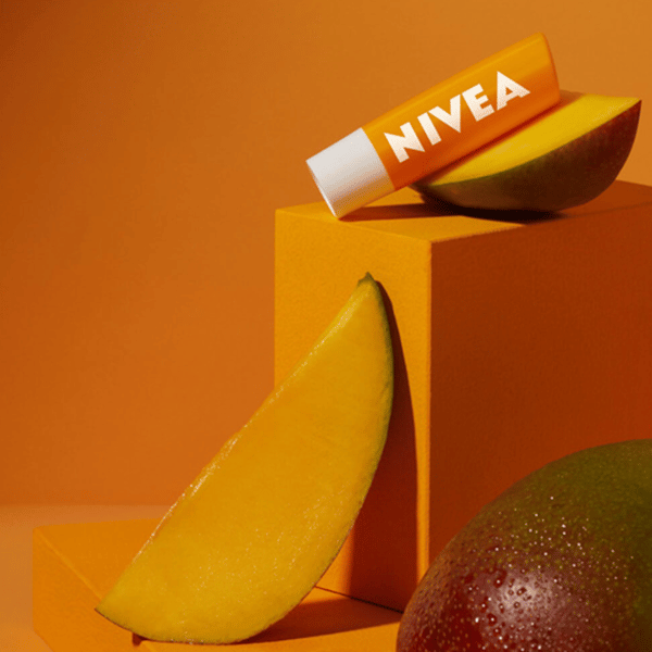 100531 NIVEA Plejende læbepomade Mango 4,8g