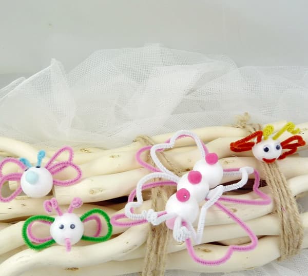 Polyesterpompoms mix röd 120 st.