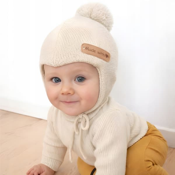 Babyhue 42-44 dobbeltbundet med pompon Forår Efterår lys BEIGE