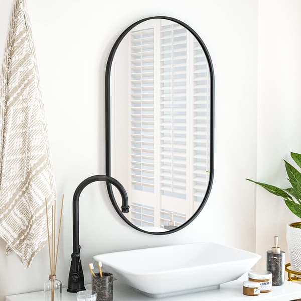 Oval spegel 80x40cm svart ram