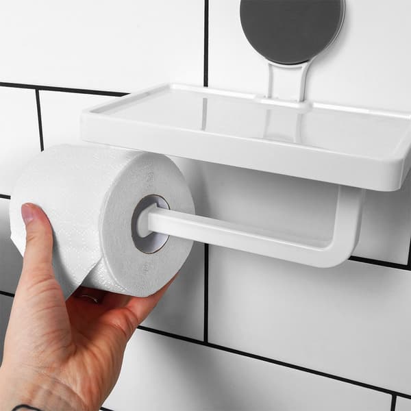 WC-paperin pitäjä hyllyllä imukupille