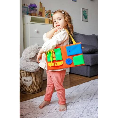 UDDANNELSESSPIL BUSY BOARD 2 MANIPULATIONSBRÆT ROTER KAFER BAG