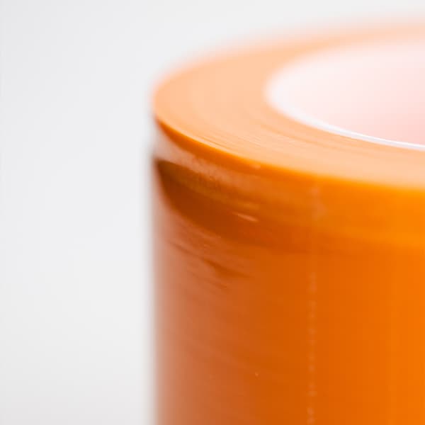 Skyddande orange film för permanent makeup