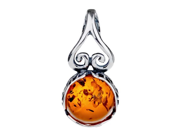 Silverhänge med bärnsten Litet oxiderat damhänge i silver