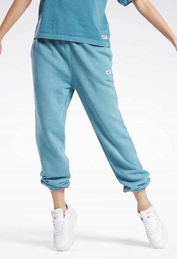 Reebok damträningsbyxor blå logga storlek L