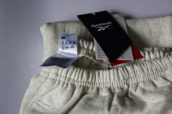 REEBOK DAME TRÆNINGSBUKSER GRÅ LOGO M 0A9B5_B* BAGGRUNDE