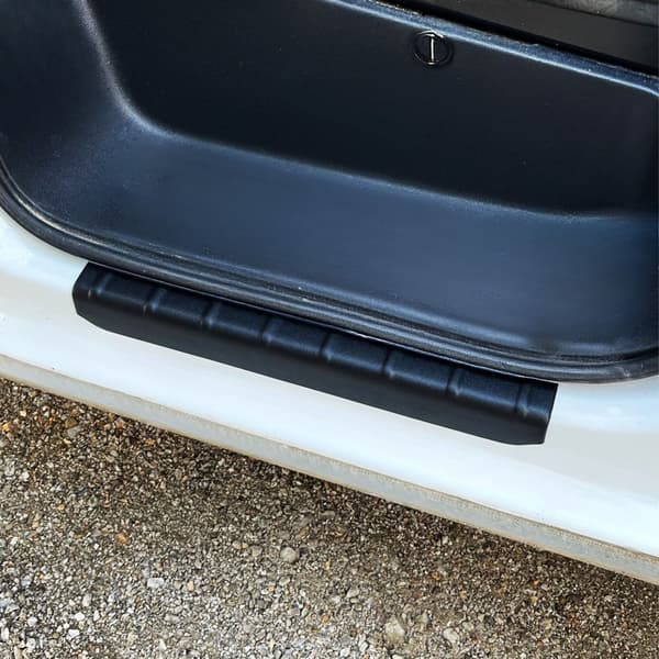 Sorte, slidstærke ABS-sidepanelbeskyttere til Ford Custom fra 2023-