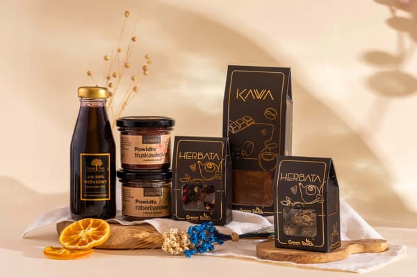 Presentkorg set blommande teer kaffe saft sylt blommor present