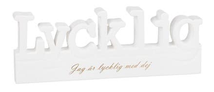 Skylt Lycklig