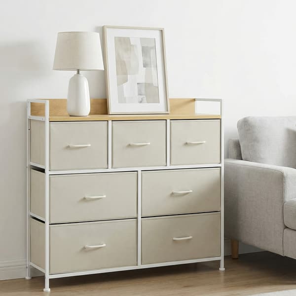 Kommode 7 stoffskuffer 28,5x98x85 cm hvit