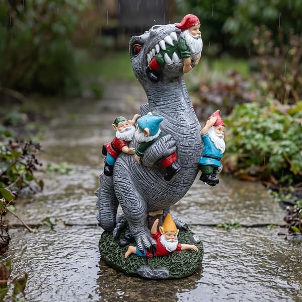 T-Rex trädgårdsdekoration som äter tomtar, Kodustaar