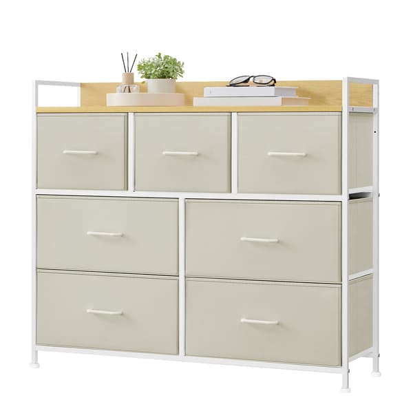 Kommode 7 stoffskuffer 28,5x98x85 cm hvit