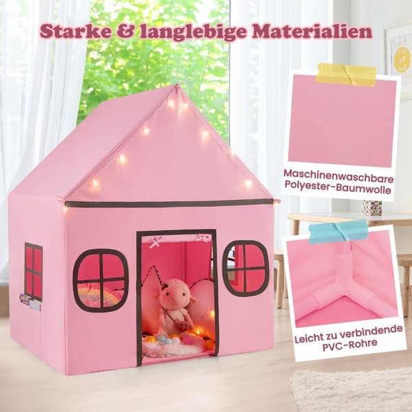 Barnas innendørs lekehustelt med stjernelys og matte