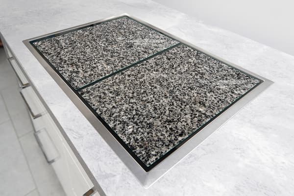 GLASSKYDDSPLÅT FÖR SPIS 85x52 GRANIT