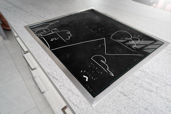 GLASSKYDDSPLÅT FÖR SPIS 70x52 SVART